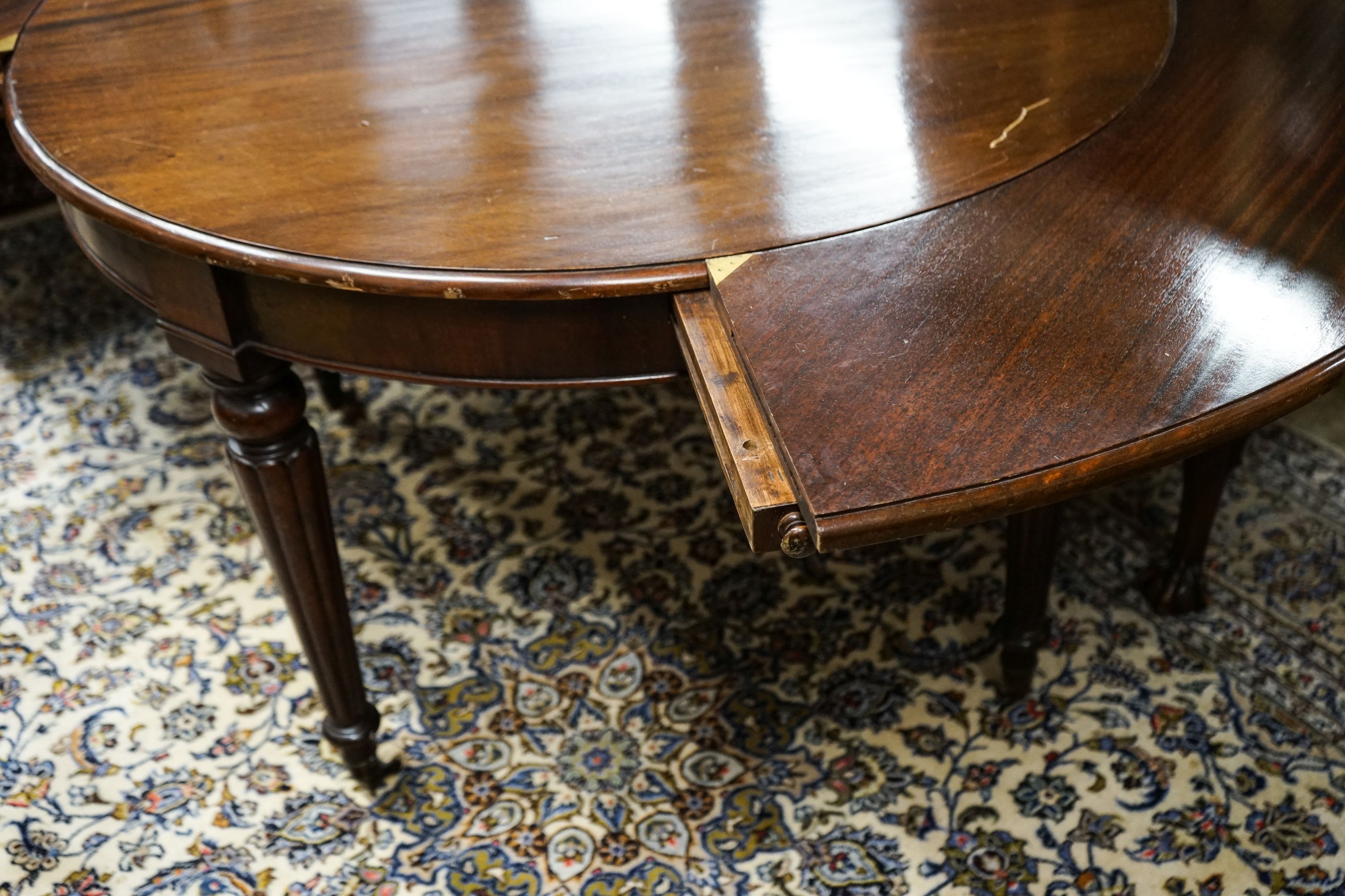 A Victorian and later circular mahogany extending dining table, 170cm diameter, height 70cm